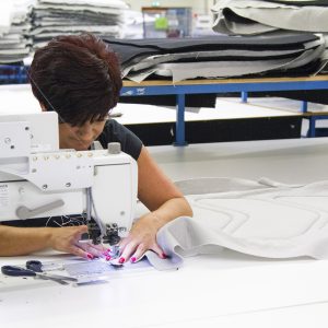 Berco - Daimler Truck Mattress Production Employee Behind Sewing Machine