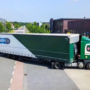 Berco - Green Scania Truck Factory Driveway Street Drone Netherlands Blue sky